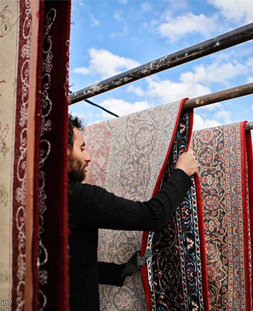خشک کردن قالی در قالیشویی شهر ری 